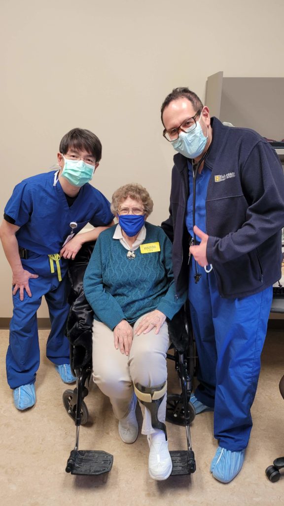 Dr. Jason Go with Sunny Wilmer, Altru’s 100th TAVR patient, and Dr. Mikhail Kirnus