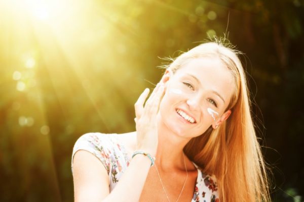 Woman smiling enjoying the sun