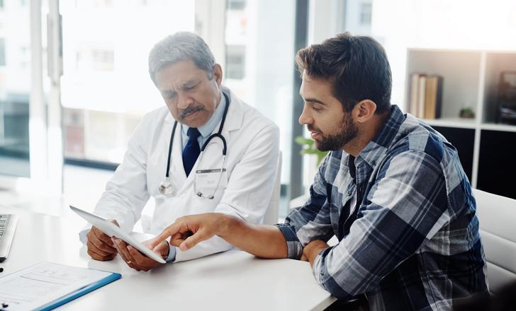 A patient talking to their doctor.