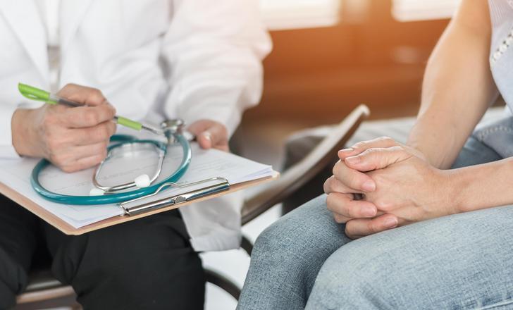 Doctor with patient at gynecology appointment