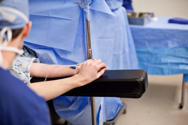holding hand before surgery