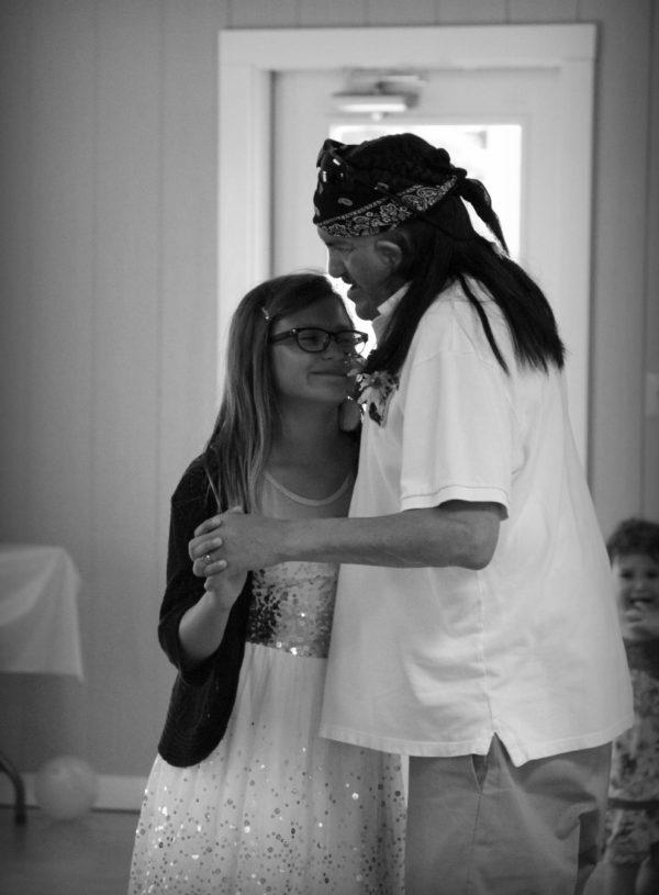 Marvin with daughter dancing