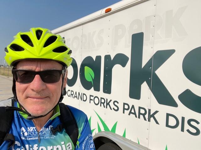 Dr. Dequet in bike gear