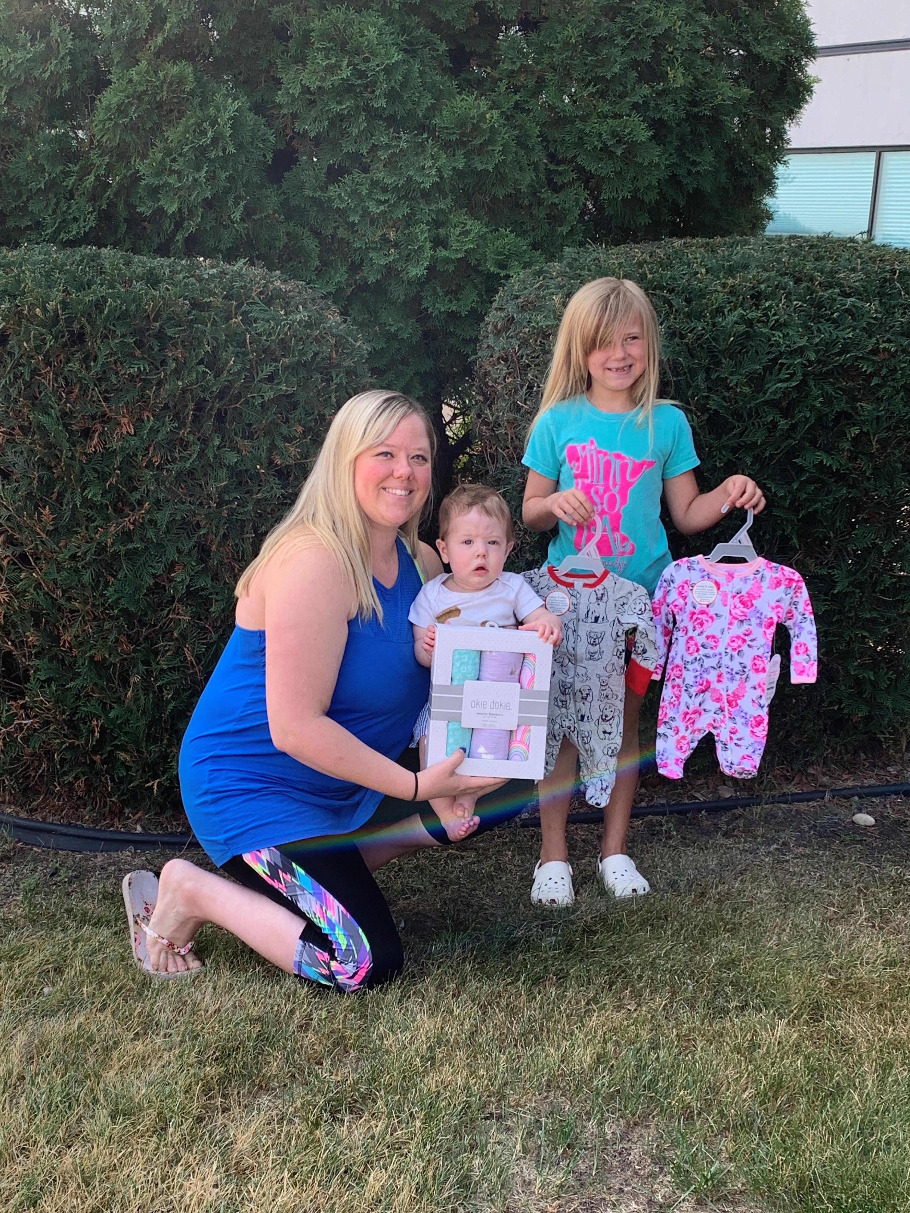 Shelby, Tucker, and Hayden posing outdoors.